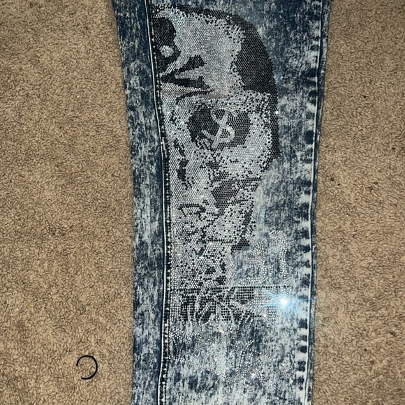 Jeans with skeleton faces